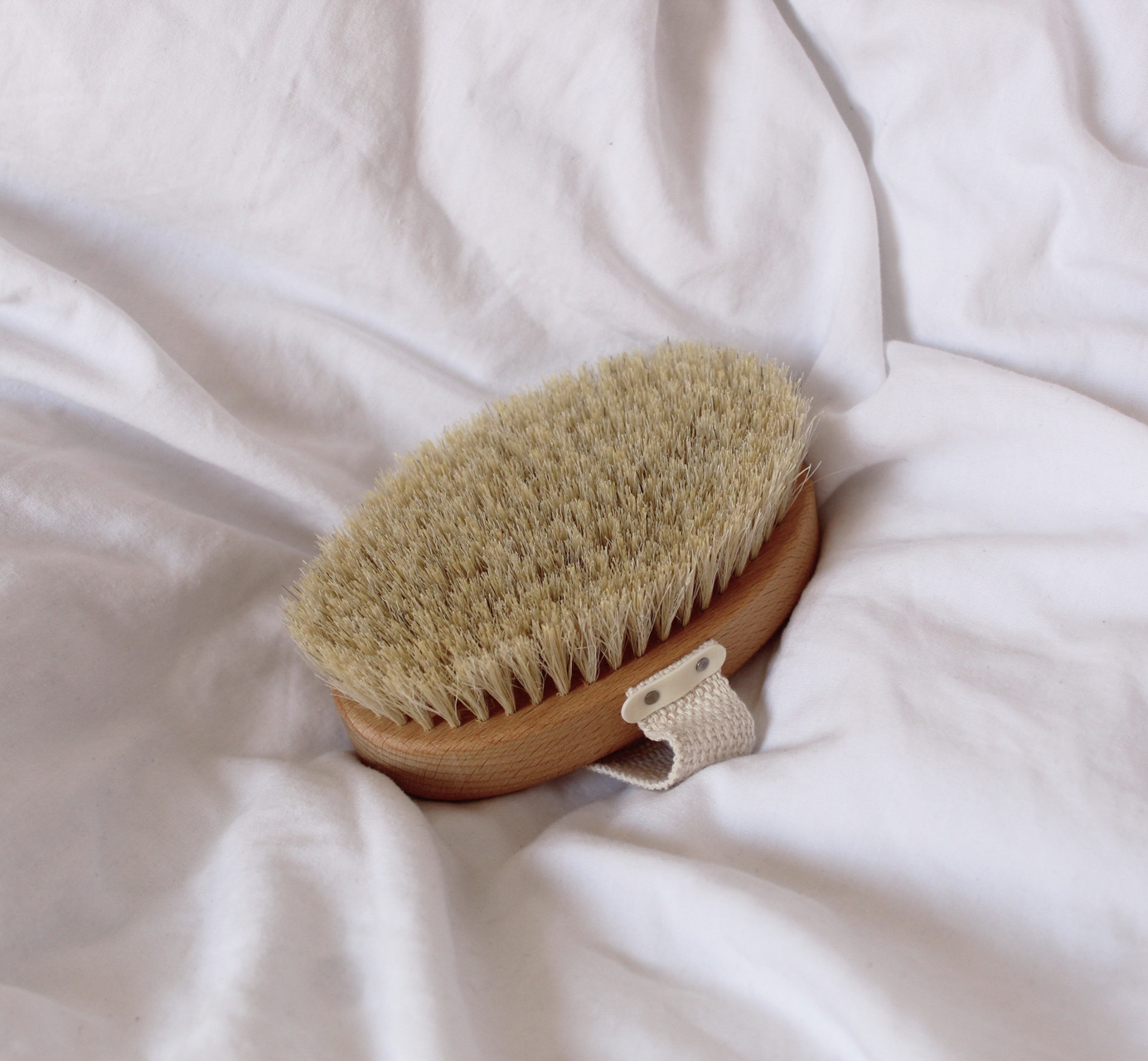 Photograph of a Dry Body Brush, an effective tool to help improve energy levels and overall well being.