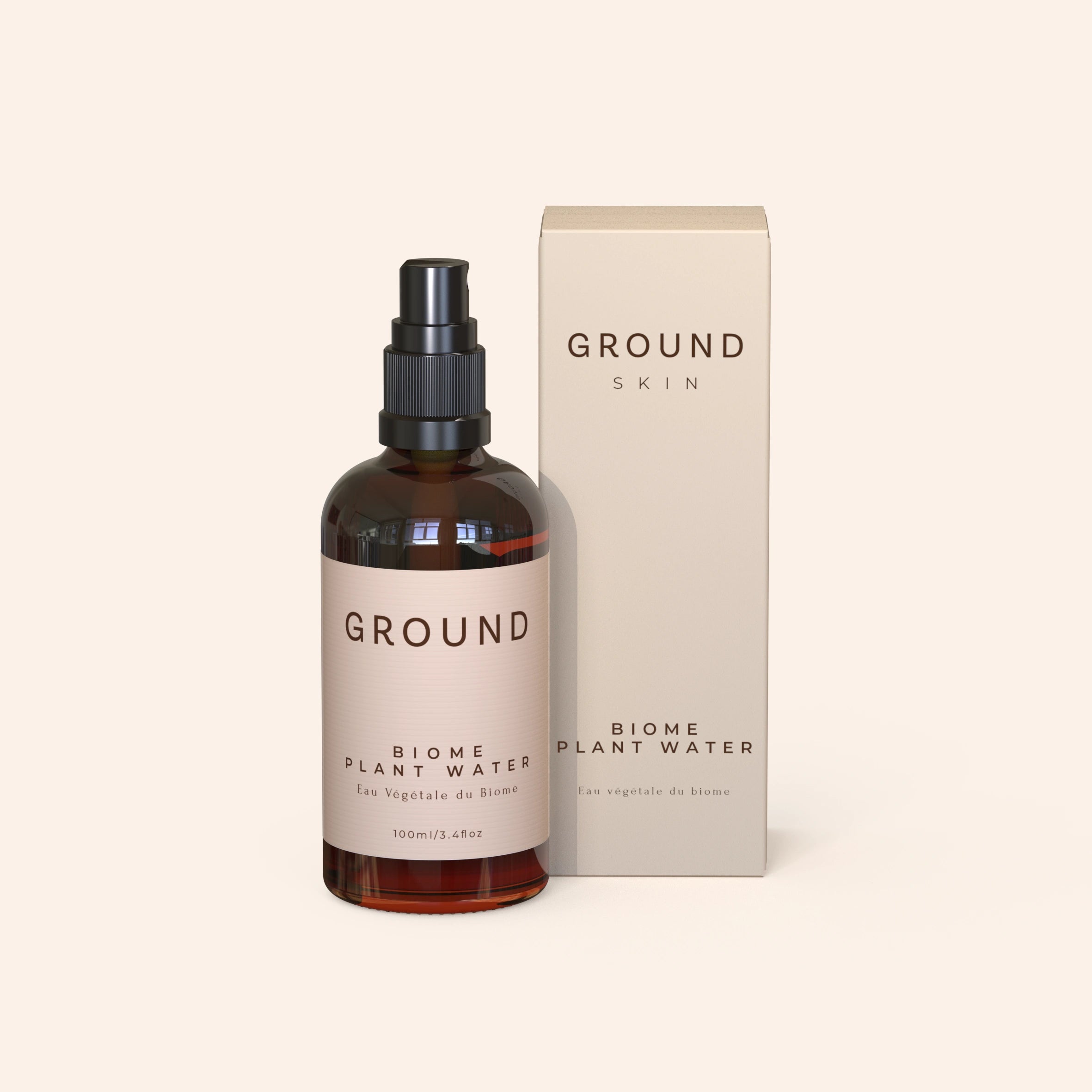 A product image featuring a spray bottle labelled 'GROUND SKIN BIOME PLANT WATER' alongside its packaging box, both with a beige color scheme.