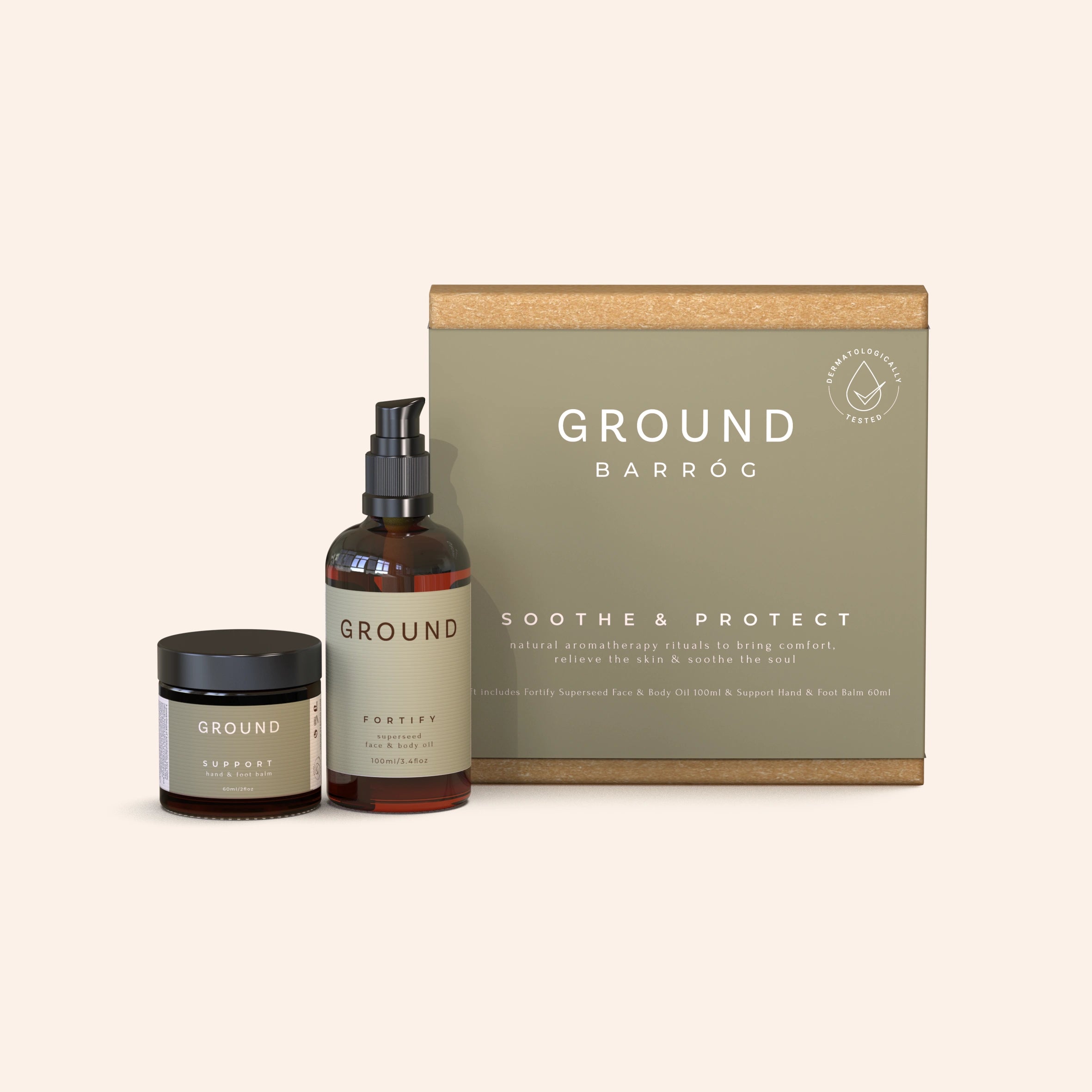 A gift box labelled 'Soothe & Protect' from Ground, featuring a jar of balm for hand and foot, and a pump bottle of Fortify Superseed Face & Body oil. Both products are in glass containers.