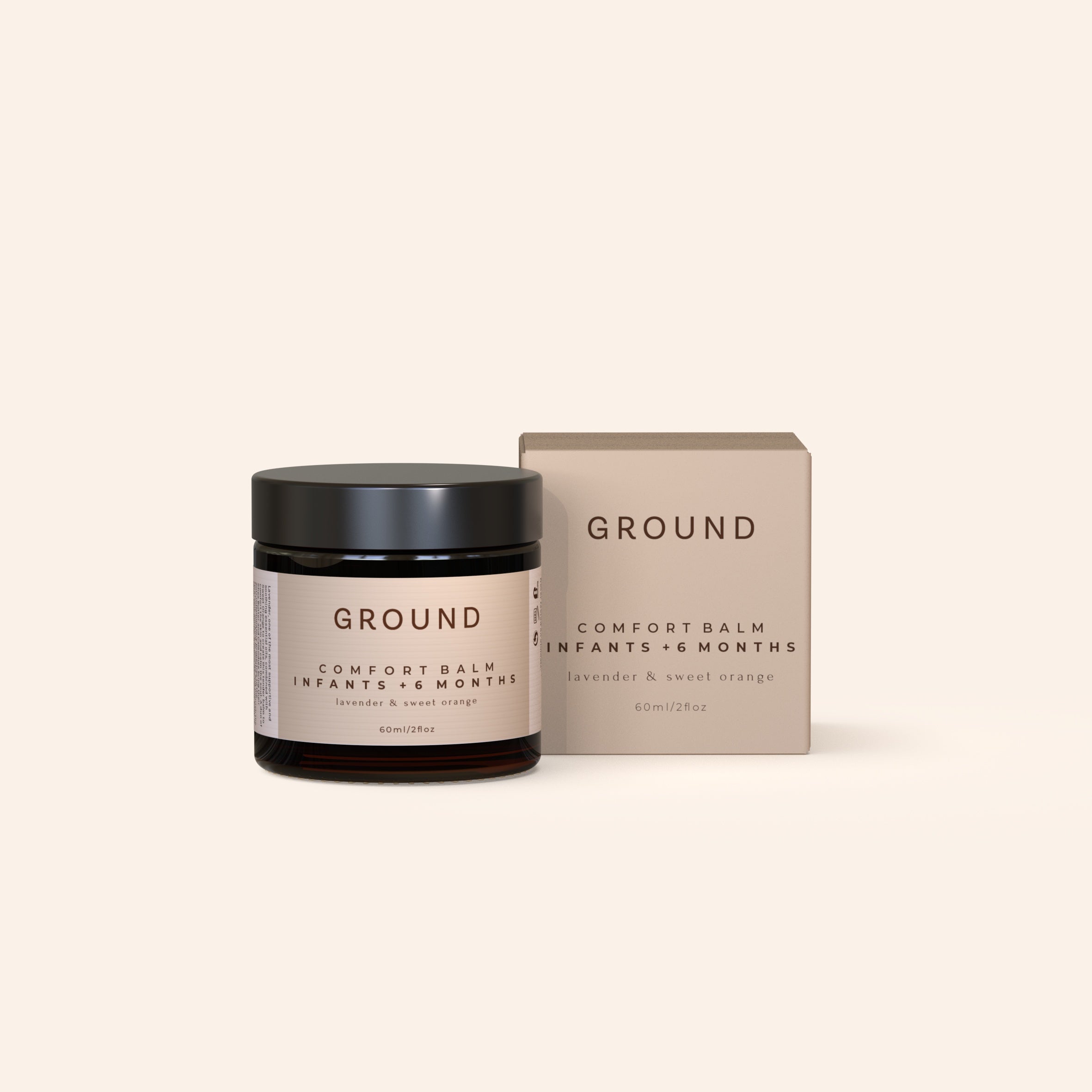 A jar of Comfort Balm by GROUND next to its packaging box. Suitable for infants 6 months and older, 60ml in size. Contains lavender and sweet orange. The dominant colours in the photograph being black, beige, and white.