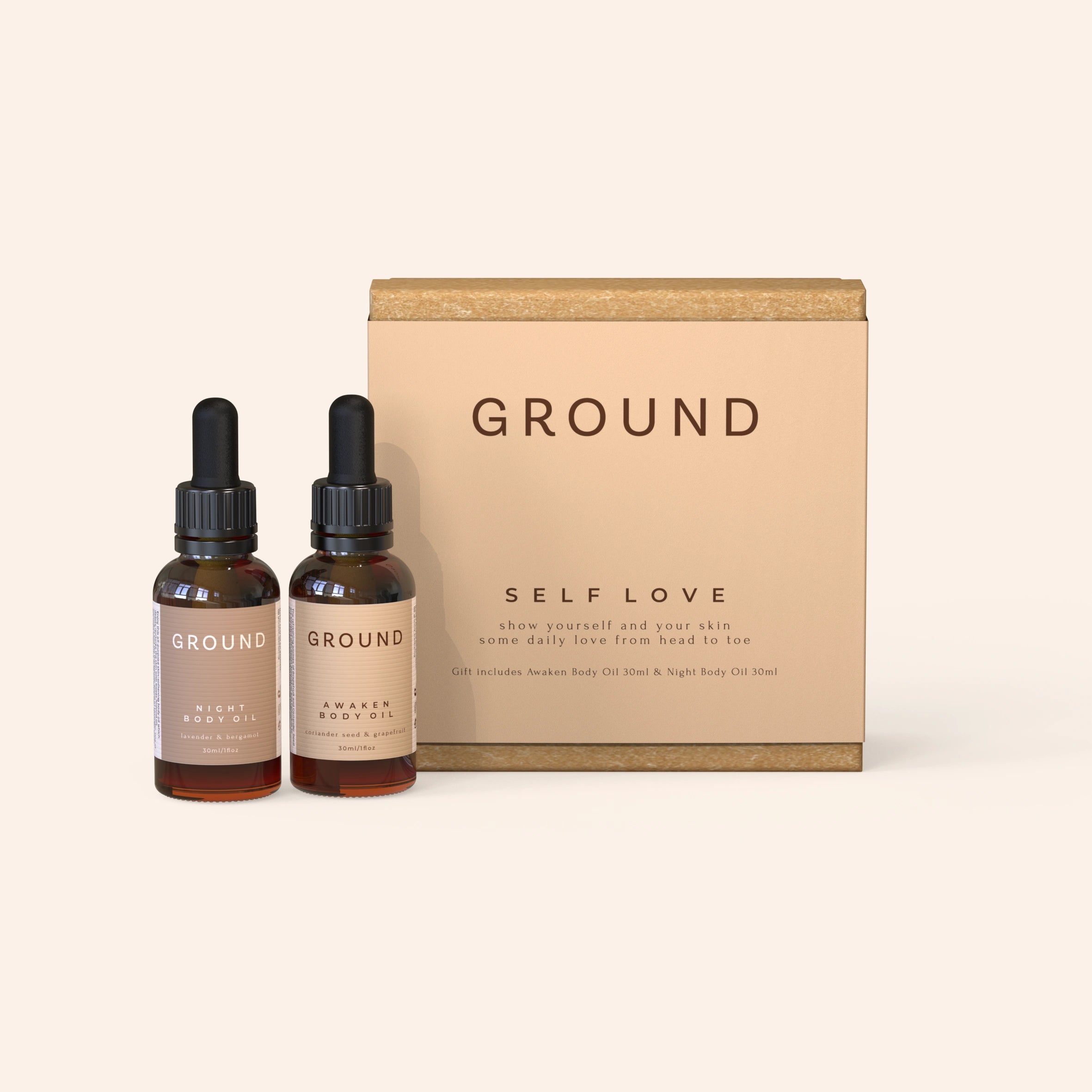 Two brown dropper bottles of body oil in glass bottles labelled 'GROUND' next to a beige box with 'Self Love' written on it.
It has the slogan "show yourself and your skin some daily love from head to toe."