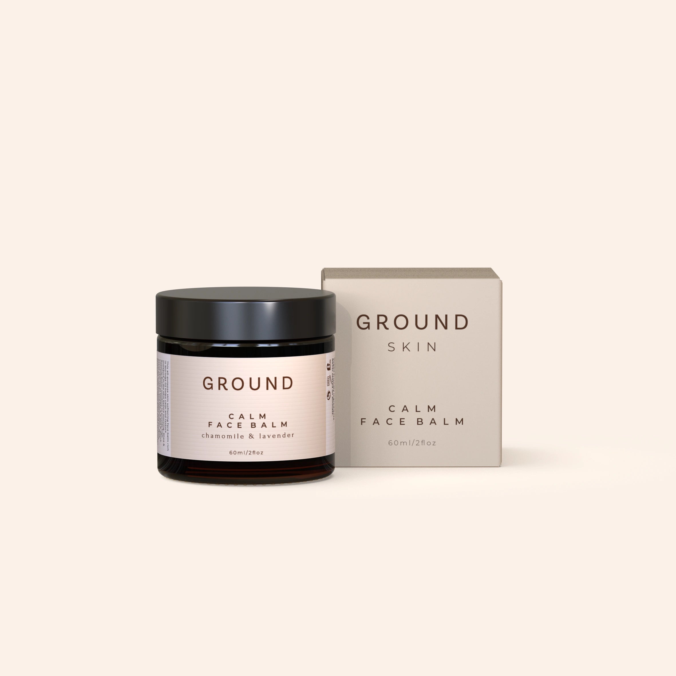 A jar of Calm Face Balm by Ground Skin positioned next to its packaging box, with a predominantly beige color scheme. This balm contains chamomile and lavender.