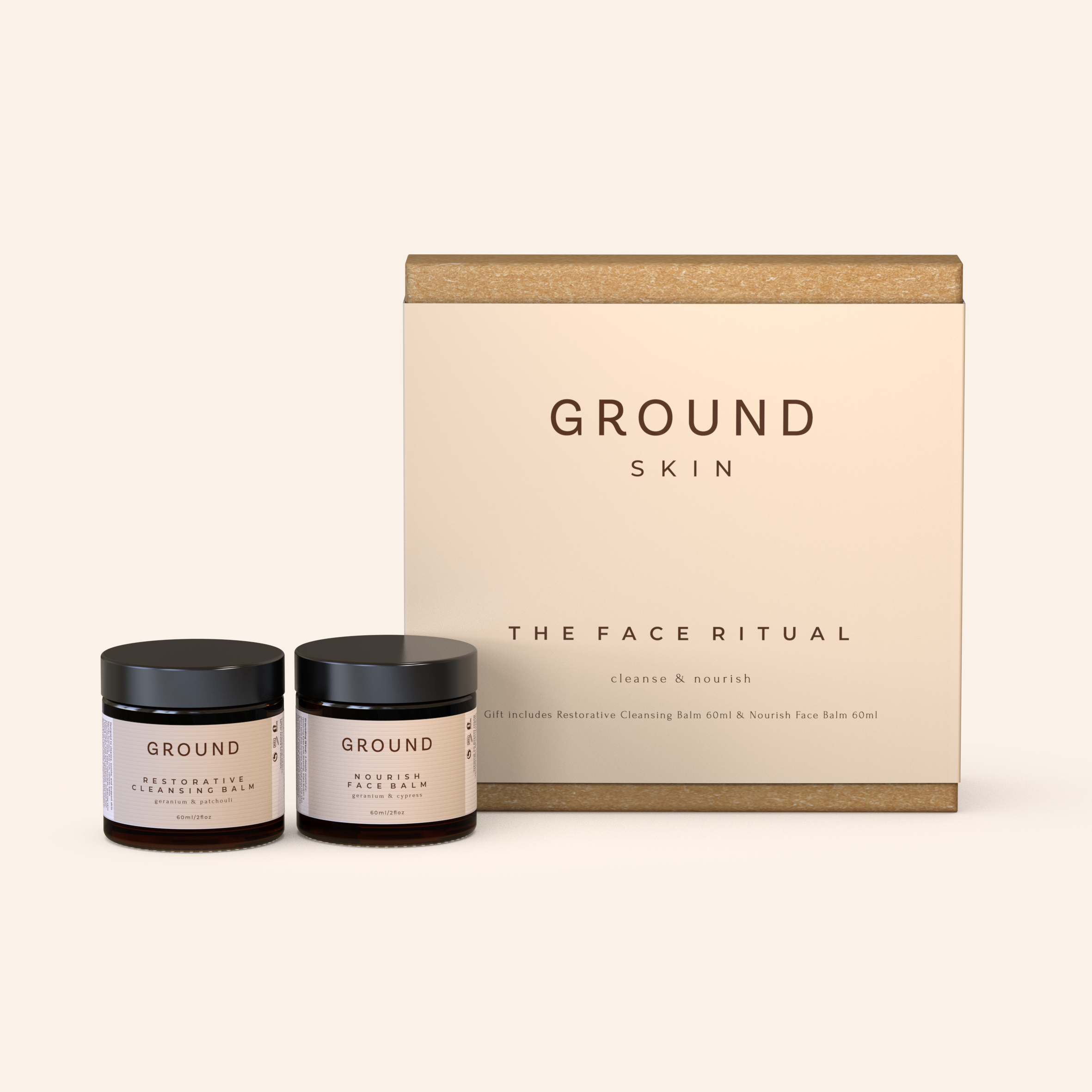 A large gift box labeled 'GROUND SKIN THE FACE RITUAL' with two jars in front of it, one labeled 'RESTORATIVE CLEANSING BALM' and the other 'NOURISH FACE BALM'.