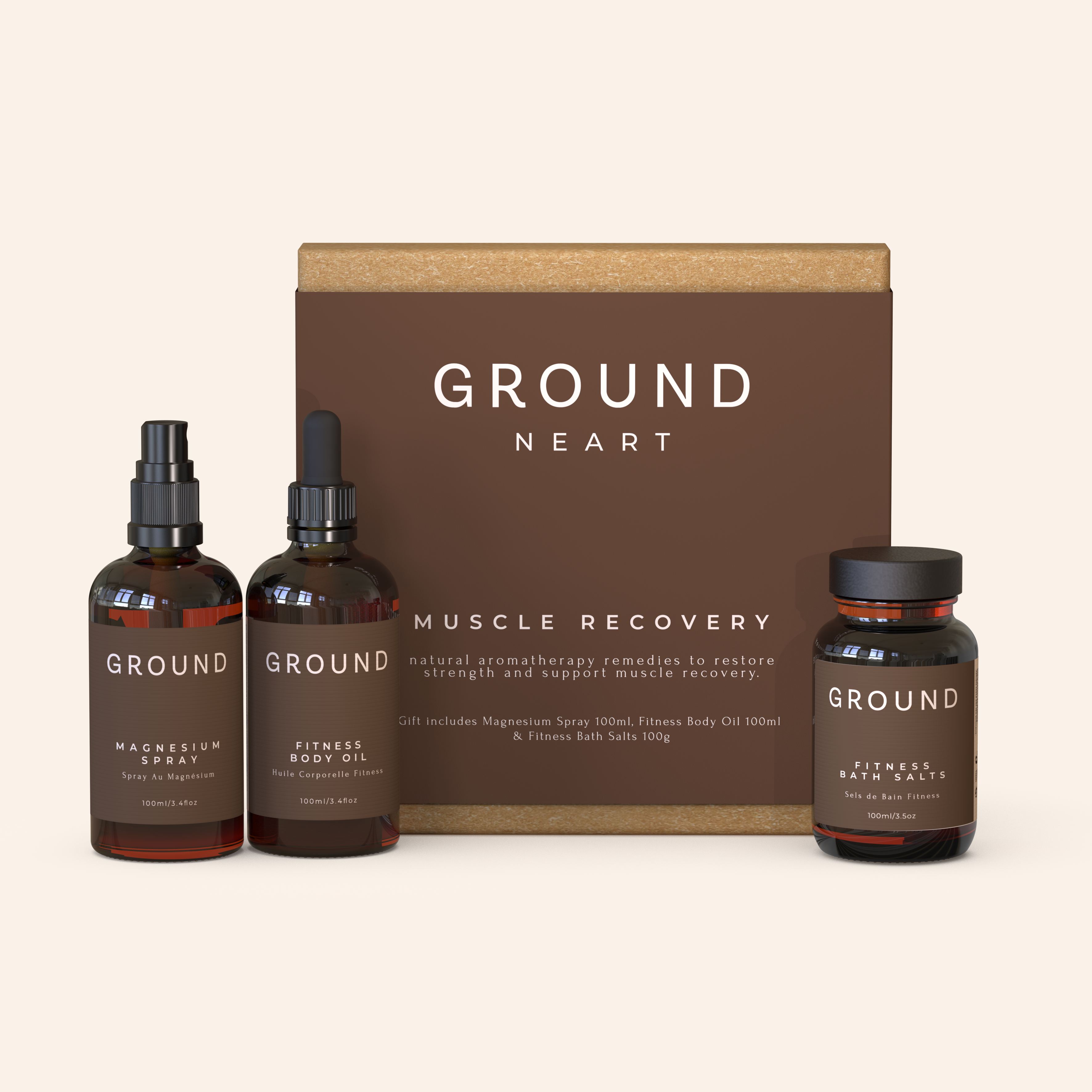 Image shows Ground Neart muscle recovery gift box. Contains 100ml magnesium spray, fitness body oil and fitness bath salts. The box shown is cardboard box with a brown sleeve stating 'GROUND' Neart Muscle Recovery with natural aromatherapy remedies to restore strength and support muscle recovery. All can be seen on a beige background.