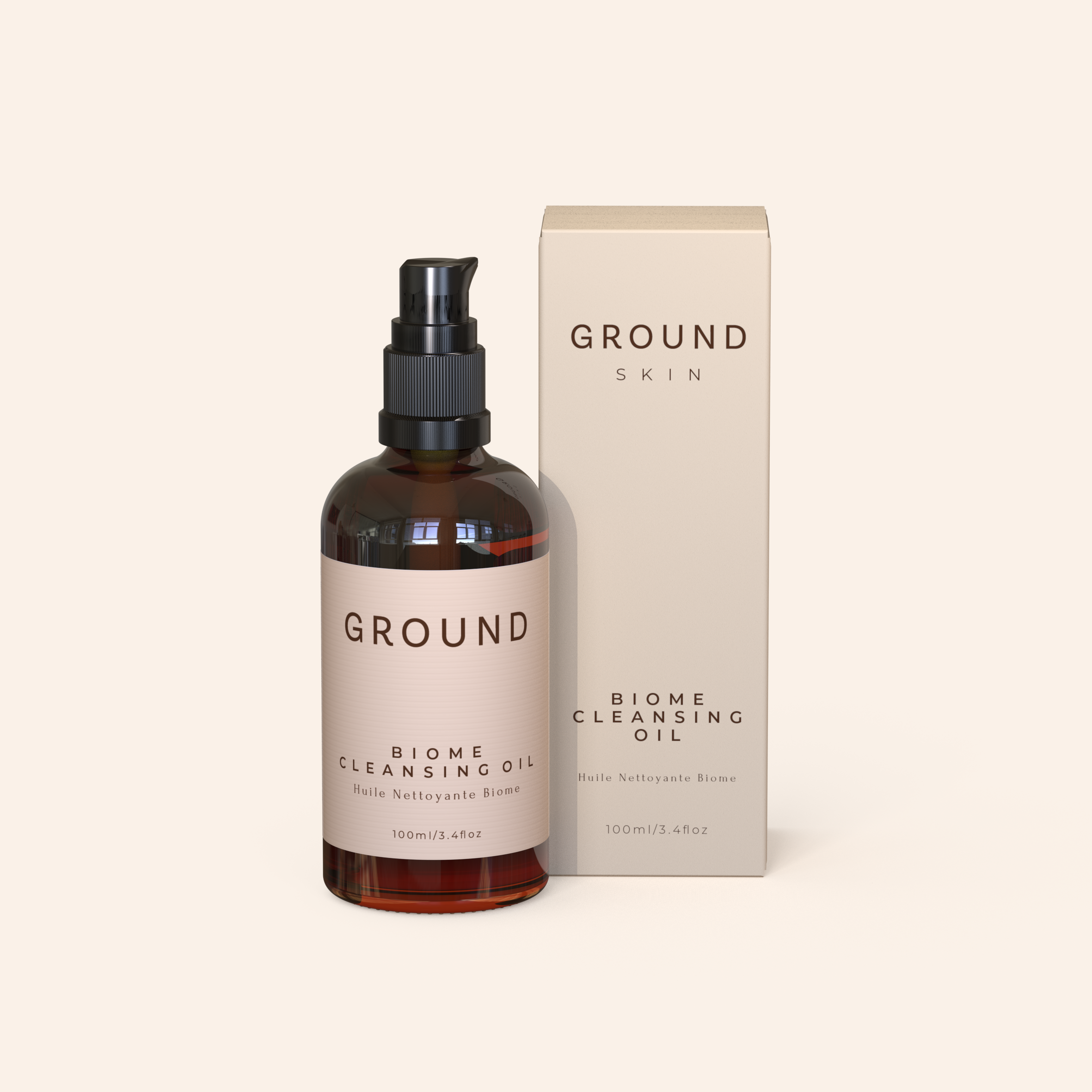 Bottle and box of Ground Biome Cleansing Oil on a white background. The bottle is made from brown glass with a pump top dispenser.