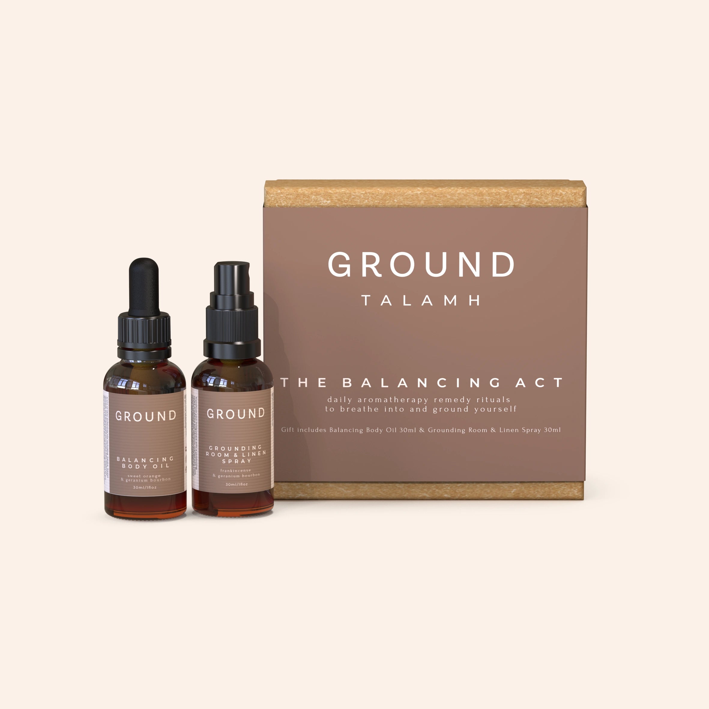 A medium-sized brown gift box labeled 'GROUND TALAMH THE BALANCING ACT' next to two brown dropper bottles, one labeled 'Grounding Room & Linen Spray 30ml' and the other 'Balancing Body Oil 30ml'.