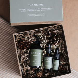 Ground wellbeing the big hug gift set The collection includes Rest Face & Body Oil, Calm Scalp Relief Oil, and Nail & Cuticle Oil, which help to offer safe and soothing relief to compromised skin. 