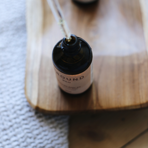 Ground wellbeing uplifting body oil