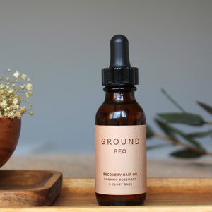 GROUND Wellbeing Beo Recovery hair oil, this deeply moisturizing oil includes Rosemary to help stimulate hair growth and Clary Sage for strong and healthy hair. 